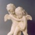 Two Cupids Fighting over a Heart