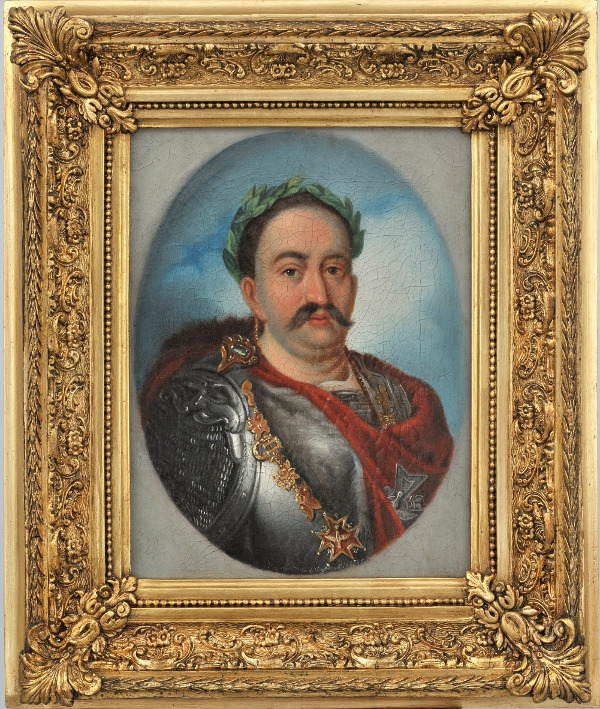 Portret Jana III Sobieskiego w zbroi antycznej i czerwonym płaszczu. Na głowie ma wieniec laurowy. Portret króla na tle nieba i białych chmur. Obraz w złotej ramie. 