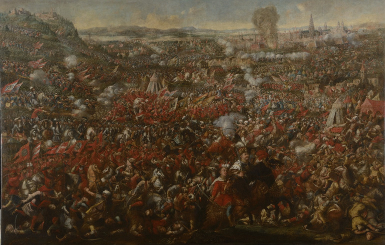 Obraz olejny na płótnie. Ilustruje wyzwolenie Wiednia w roku 1683. Większą cześć kompozycji wypełniają walczące ze sobą wojska. Widać namioty tureckie, kłęby dymu. W tle widać zarys miasta i pejzaż. Na pierwszym planie król Jan III Sobieski na koniu.