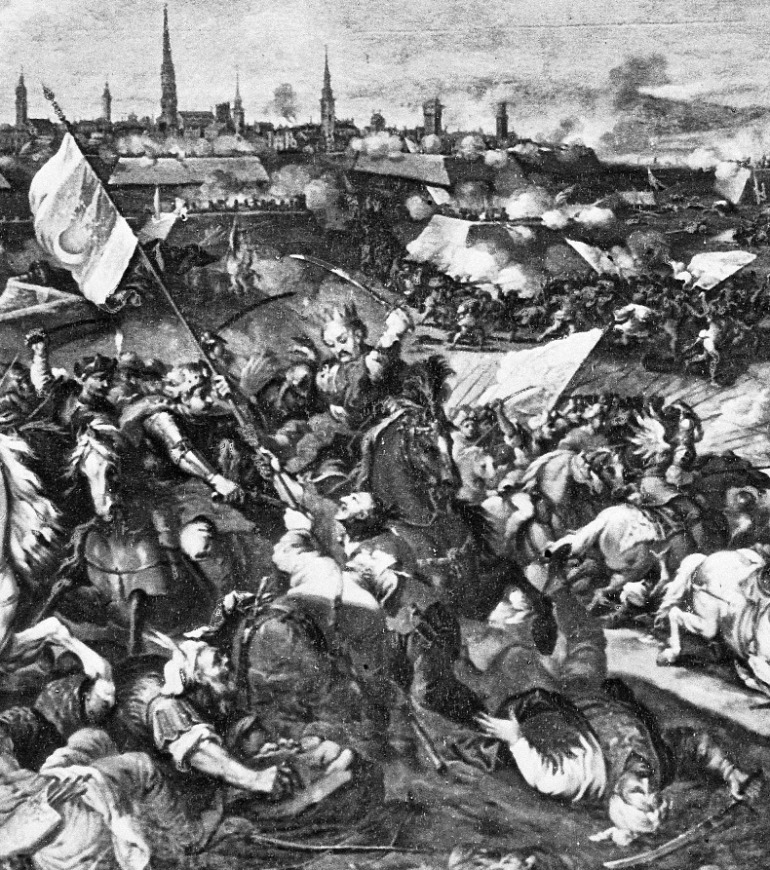Zbliżenie na fragment obrazu, który przedstawia końcówkę walk o wyzwolenie Wiednia. Widzimy obcięte  głowy, pokaleczone ciała, żołnierzy umierających w dramatycznych pozach. W samym centrum kompozycji grupa trzech jeźdźców na wspiętych koniach. Po prawej stronie rozpoznać możemy króla Jana III Sobieskiego. 
